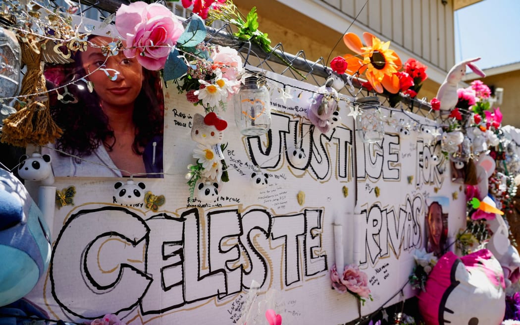 A makeshift memorial with flowers, candles and stuffed toys sits honoring Celeste Rivas Hernandez, 14, near Jamieson Street in Lake Elsinore, California, after the arrest of musician d4vd, April 17, 2026.
Mandatory Credit:	Arafat Barbakh/Reuters via CNN Newsource