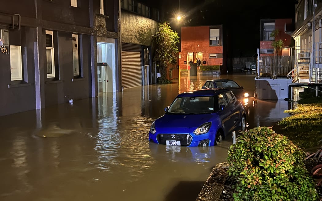 Flooding outside Duckworth Lewis guesthouse in Wellington.