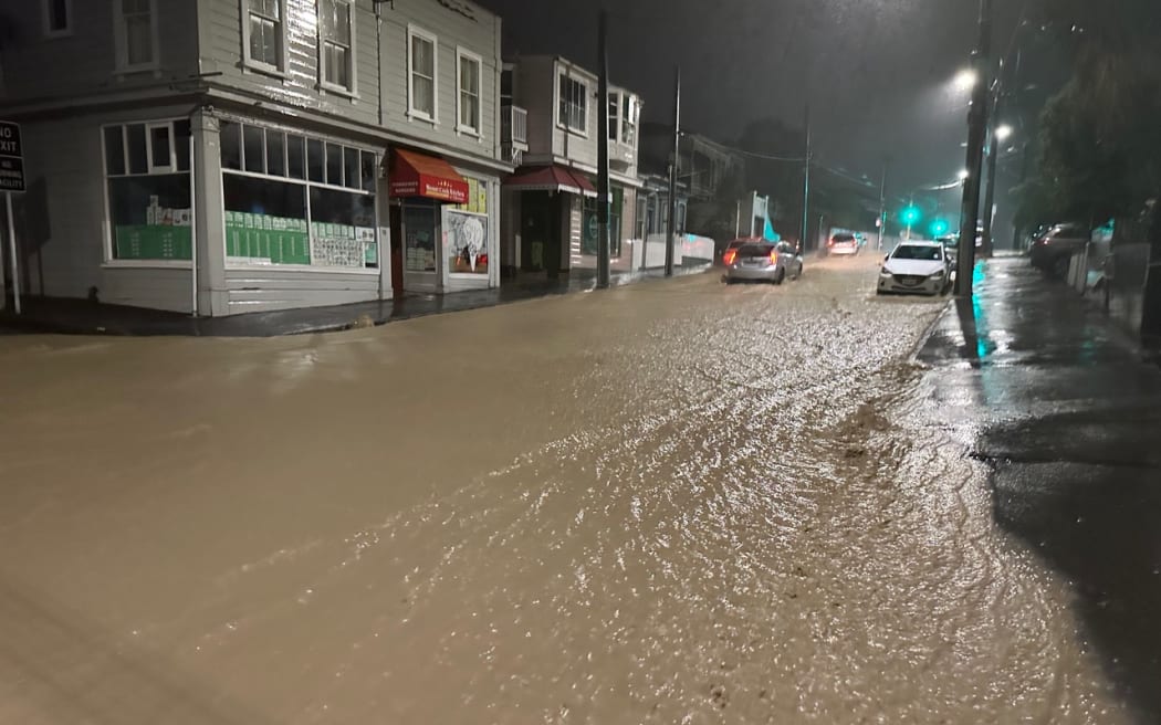 Mt Cook Wallace Street Hargreaves St and Wright Street floating vehicles where the Papawai Stream has overwhelmed the local stormwater network photos taken just after 4am