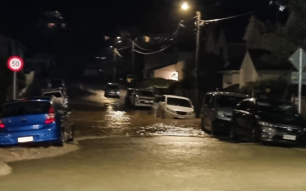 Flooding has caused cars to become stuck on Dee Street in Wellington.