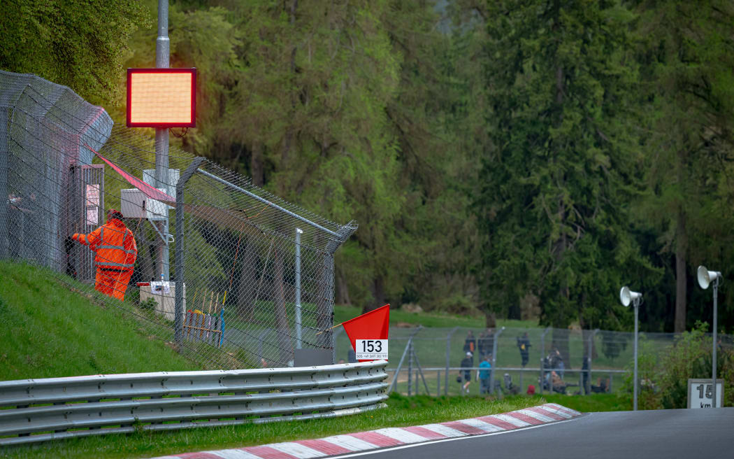 A code red is issued following a serious accident during the ADAC 24h Nurburgring race at the Nurburgring in Nurburg, Germany, on April 18, 2026. (Photo by Jack Brekelmans/EYE4IMAGES/NurPhoto) (Photo by Jack Brekelmans / NurPhoto via AFP)