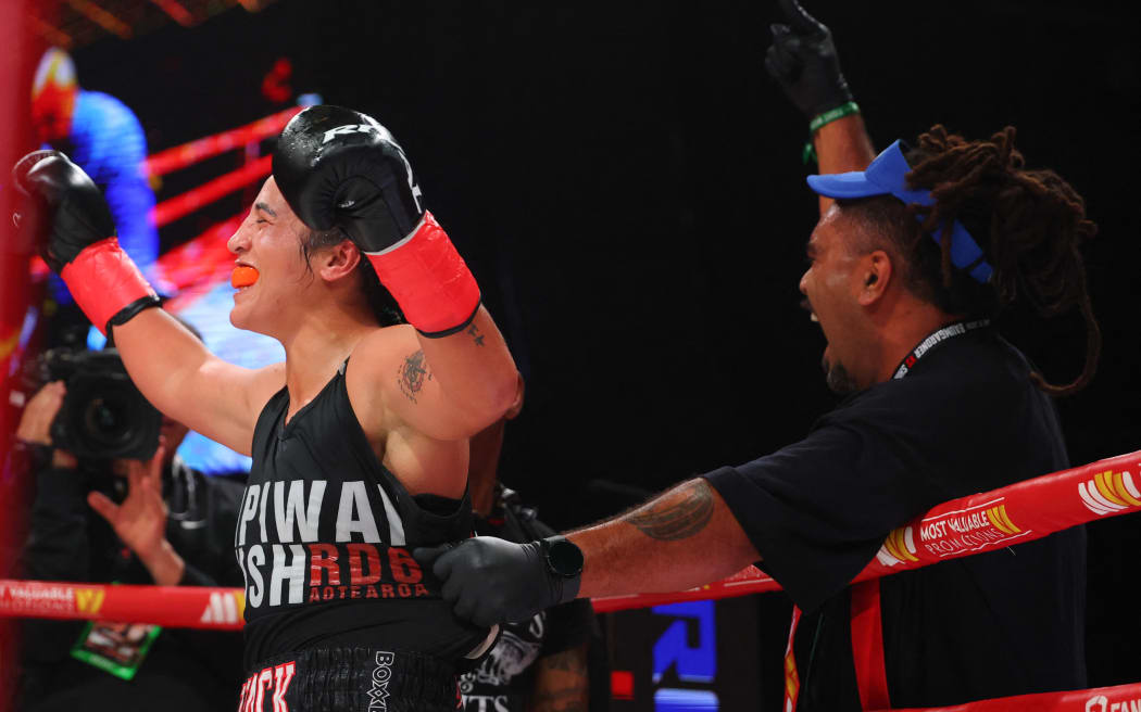 Lani Daniels raises her gloves after her TKO win over Shadasia Green during their IBF, WBO and Ring Magazine championship bout at Madison Square Garden, New York City,  on April 17, 2026. 
(Photo by Ed Mulholland / GETTY IMAGES NORTH AMERICA / Getty Images via AFP)
