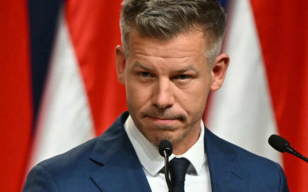 Peter Magyar, election winner and leader of the pro-European conservative TISZA party, delivers a press conference at the HUNGEXPO Congress and Exhibition Center in Budapest, Hungary, on April 13, 2026, one day after Hungarian general elections. The party of conservative Peter Magyar won a two-thirds parliamentary majority in Hungarian elections in a clear defeat for nationalist long-time Prime Minister Viktor Orban, according to near-complete results.