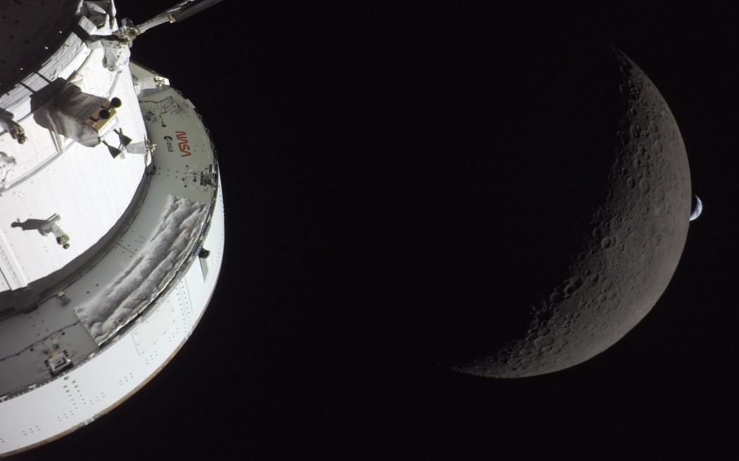 NASA’s Orion spacecraft captures the Moon and the Earth in one frame during the Artemis II crew’s deep space journey on the sixth day of the mission.