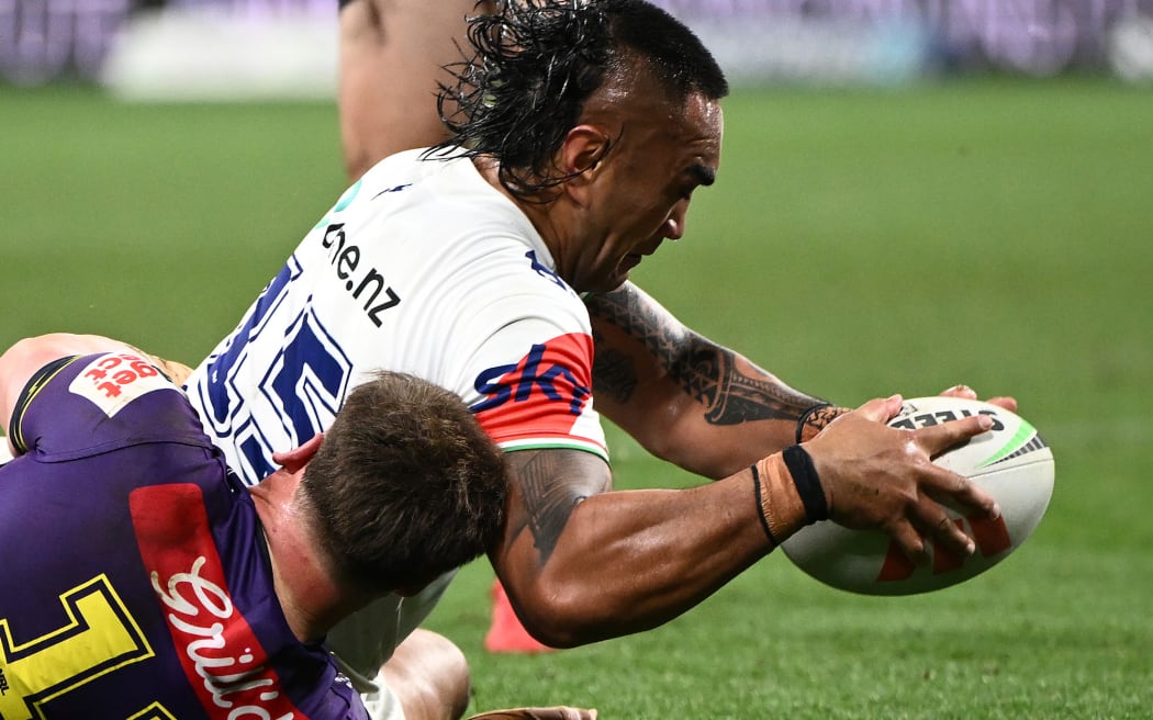 Marata Niukore of the Warriors scores a try during the NRL Round 6 match between the Melbourne Storm and the New Zealand Warriors at AAMI Park in Melbourne.