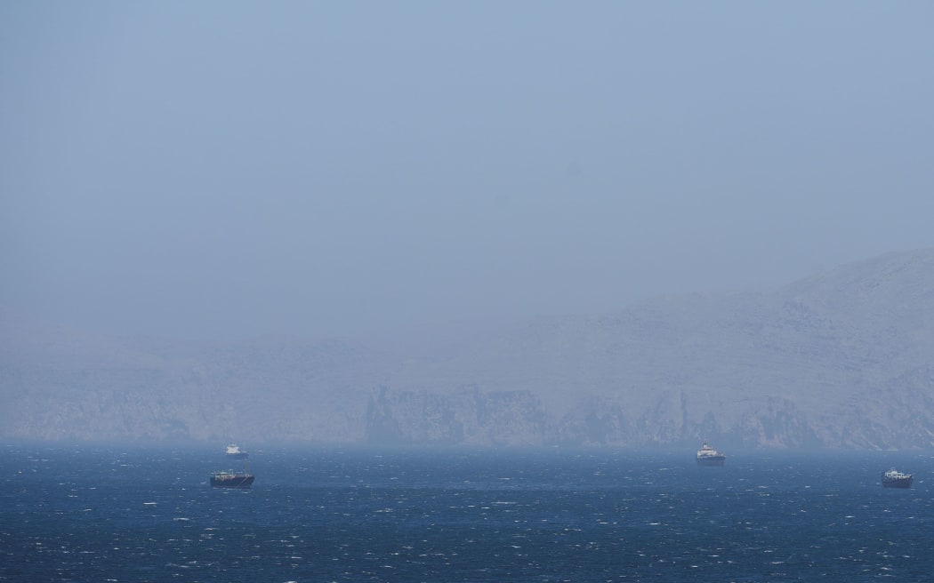 Boats overlooking the Strait of Hormuz, in Musandam governance, in Oman, April 8.