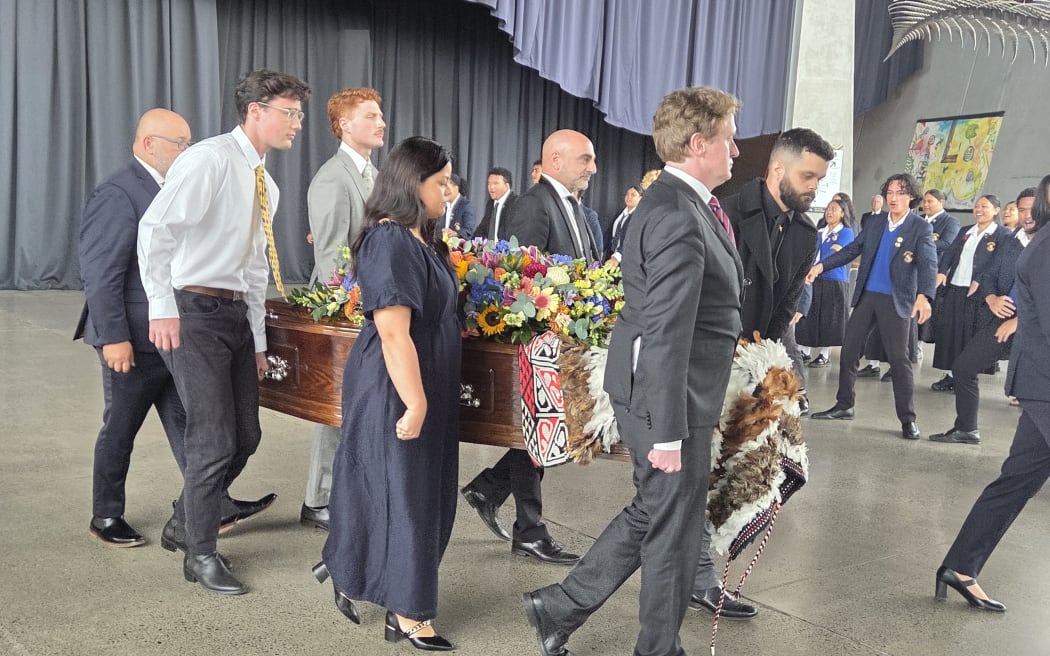 Family members and friends carried the casket of former Manukau City Mayor Sir Barry, with Kapa Haka from Otahuhu college students - Sir Barry's old school.