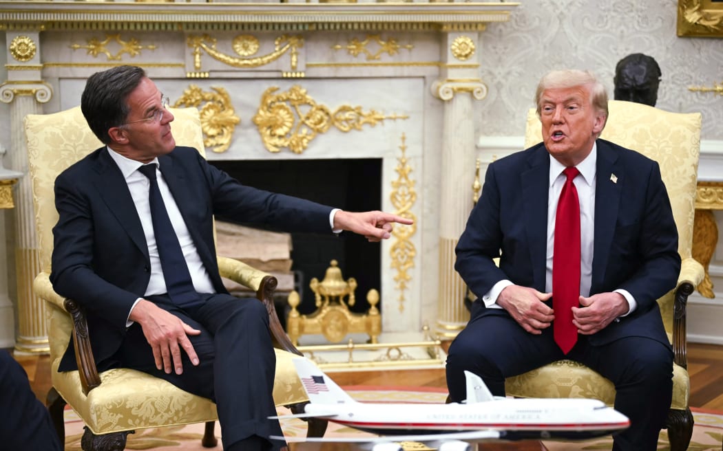US President Donald Trump meets with NATO Secretary General Mark Rutte (L) in the Oval Office of the White House in Washington, DC on July 14, 2025. President Trump warned Russia on Monday that he will impose "very severe" tariffs against Moscow's remaining trade partners if it doesn't resolve its war in Ukraine within 50 days. (Photo by ANDREW CABALLERO-REYNOLDS / AFP)