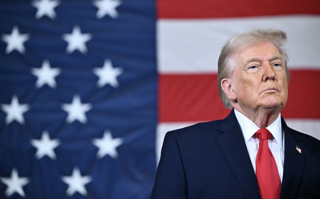 US President Donald Trump looks on during an event with members of the military and their families at Fort Bragg, North Carolina on February 13, 2026. Trump will meet on Friday with the special forces soldiers who captured Venezuelan leader Nicolas Maduro in a deadly raid in Caracas in January. (Photo by Mandel NGAN / AFP)