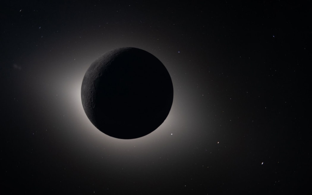 Totality, beyond Earth. From Artemis II's vantage point, the moon eclipses the sun, revealing a view few in human history have ever witnessed.