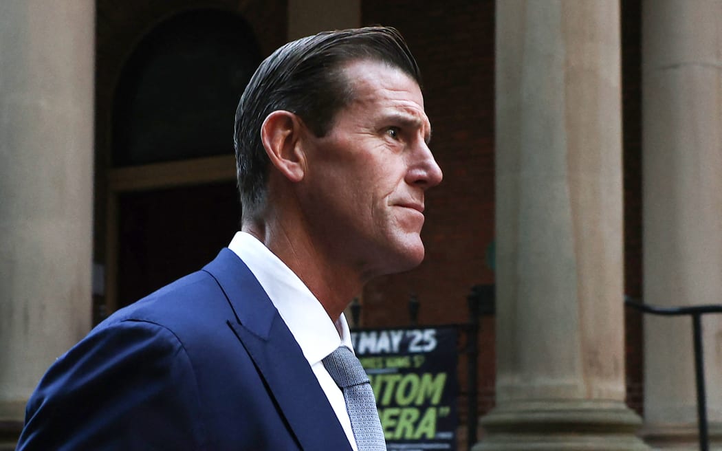 Former member of Australia's elite Special Air Service regiment Ben Roberts-Smith leaves the Federal Court in Sydney on May 1, 2025. Ben Roberts-Smith was back in court on May 1 to push to reopen his appeal against the judgment in the defamation case that implicated him in a string of war crimes in Afghanistan. (Photo by Saeed KHAN / AFP)