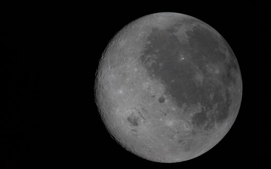 This handout image released by NASA shows a fully illuminated view of the Moon, including the Orientale basin and parts of the far side not visible from Earth, on April 6, 2026.
