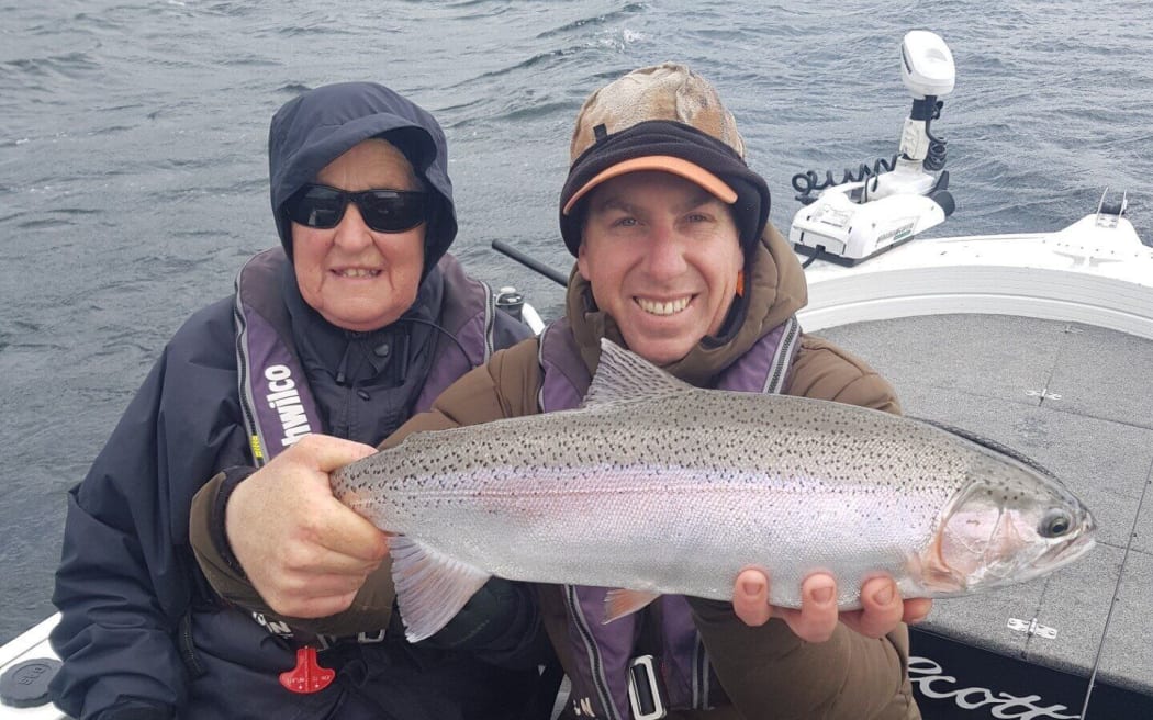Rotorua Trout Guide, Julian Danby (right) says he may need to consider abandoning the impacted lakes. Photo / Supplied