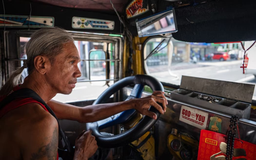 Jeepney driver Eddie Ramos has been acutely affected by rising fuel costs.
