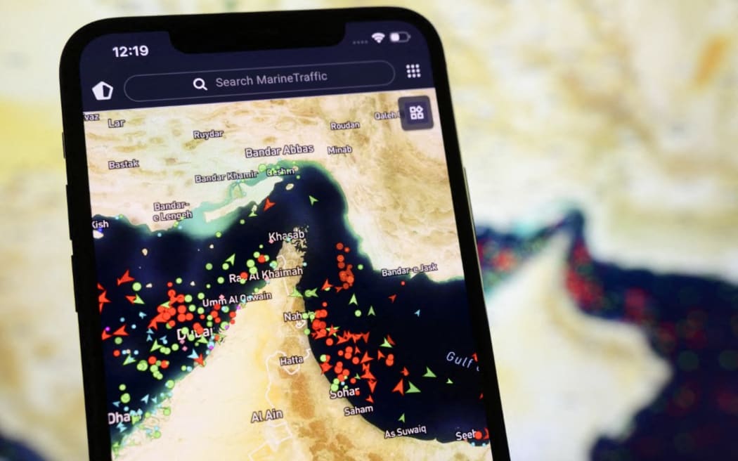 A MarineTraffic map shows a high concentration of ship beacons in the Strait of Hormuz, on 27 March, 2026.