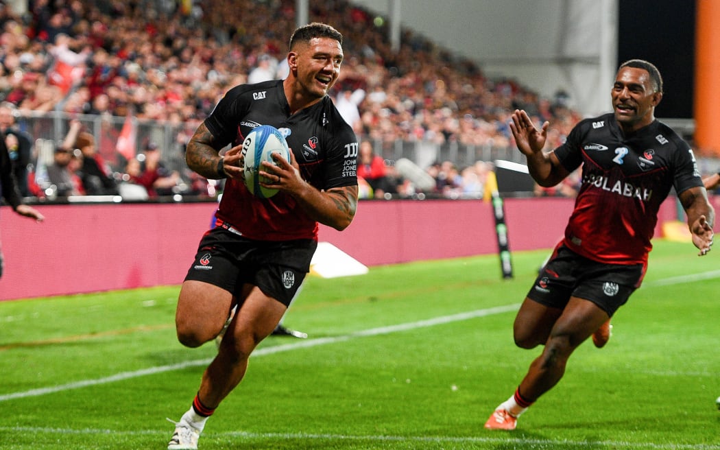 Codie Taylor crosses for his fourth try for the Crusaders against the Fijian Drua.