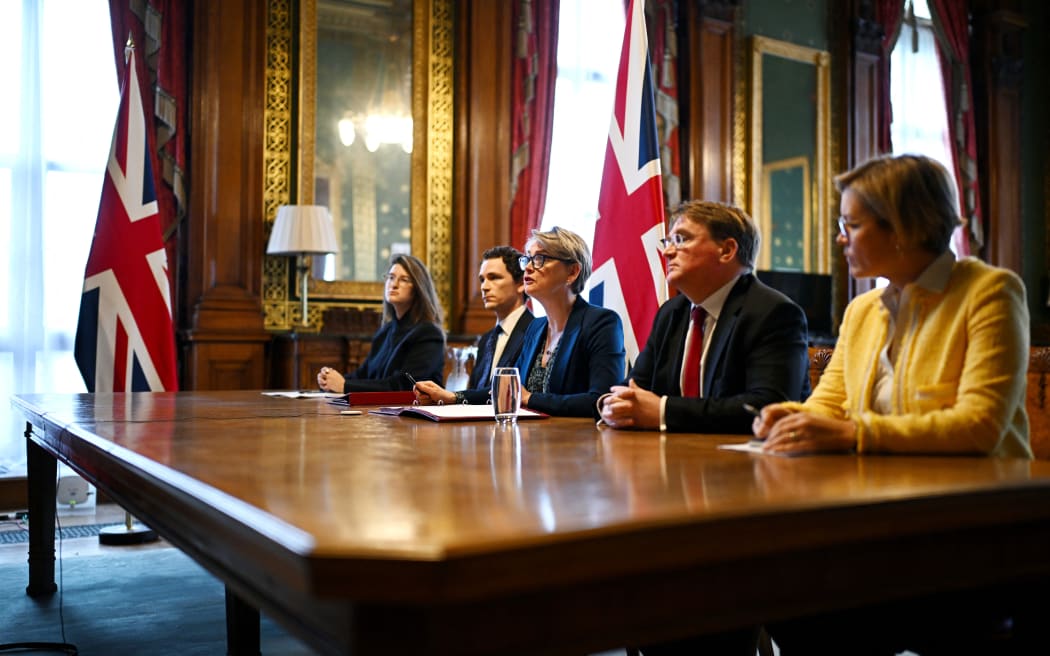 Britain's Foreign Secretary Yvette Cooper (C) hosts a virtual summit at the Foreign & Commonwealth Office in London on April 2, 2026. British Foreign Minister Yvette Cooper stressed on April 2, the "urgent need" to reopen the Strait of Hormuz as she convened a meeting of more than 40 countries on the vital shipping route.