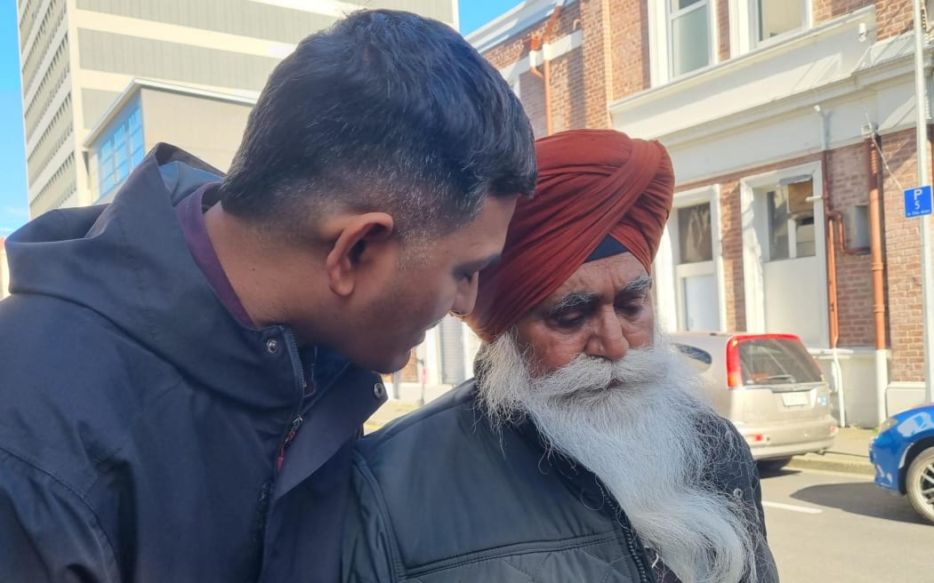 Gurjit Singh's father Nishan Singh, right, and his friend Hiren Patel who acted as interpreter during the trial.