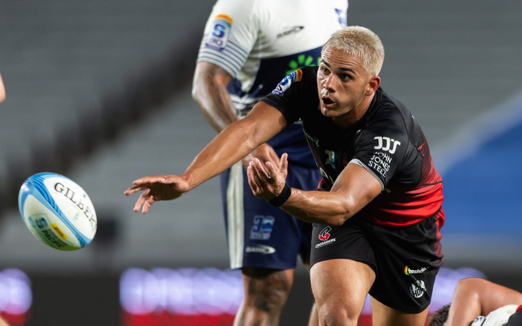 Crusaders halfback Noah Hotham in action against the Blues.