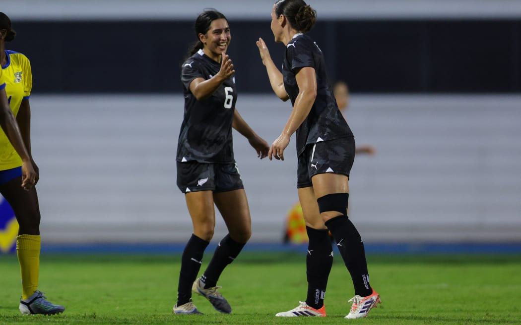 New Zealand's Michaela Foster celebrates after scoring a goal with Maya Hahn during FIFA Women's World Cup Qualifiers.