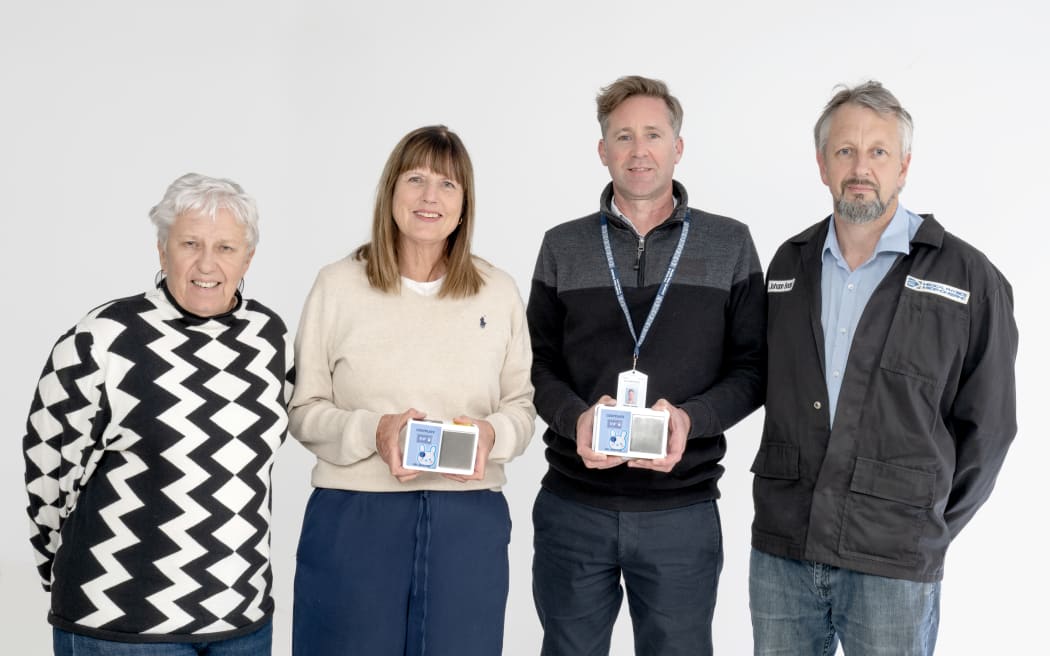 The team behind the Cosyplate Gel Warmer (from left) Angela Deken, Newborn Hearing Screening Programme Co-ordinator, Pam Spark, Hearing Screener, Stefan James, Electronics Technician and Johann Bader, Mechanical Technician
Cosyplate 03: Baby Lihona sleeps while she has her hearing checked