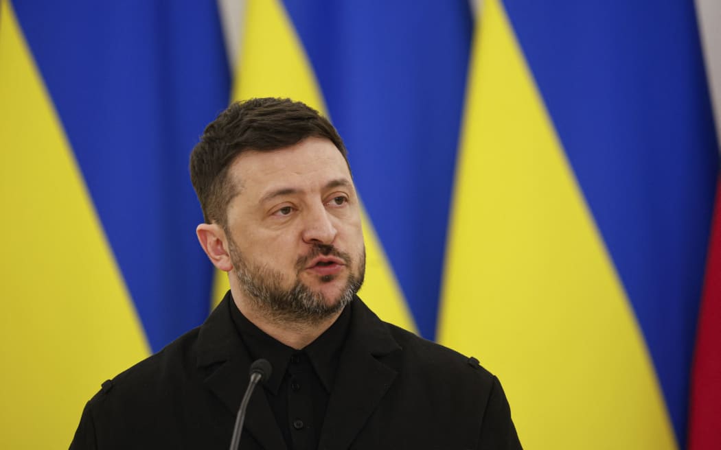Ukraine's President Volodymyr Zelensky speaks during a joint press conference with Lithuania's President and Poland's President, after attending commemorations of the 1863 uprising, in Vilnius on January 25, 2026. (Photo by Petras Malukas / AFP)