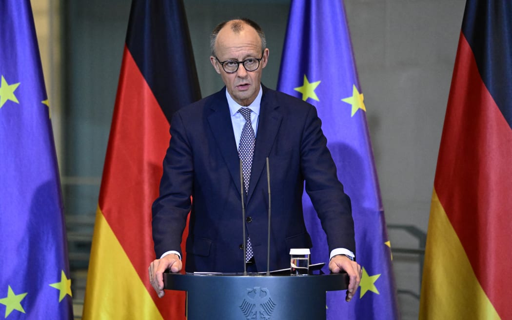 German Chancellor Friedrich Merz delivers a statement at the chancellery after a  pensions bill passed Germany's Bundestag, in Berlin on December 5, 2025. The bill, which passed with 319 voting in favour, had become a key point of contention in the government, with Merz having to balance the demands of his leftist SDU coalition partners with younger members of his conservative CDU/CSU alliance. (Photo by John MACDOUGALL / AFP) / “The erroneous mention[s] appearing in the metadata of this photo by John MACDOUGALL has been modified in AFP systems in the following manner: [at the chancellery ] instead of [at the Bundestag, Germany's lower house of parliament]. Please immediately remove the erroneous mention[s] from all your online services and delete it (them) from your servers. If you have been authorized by AFP to distribute it (them) to third parties, please ensure that the same actions are carried out by them. Failure to promptly comply with these instructions will entail liability on your part for any...