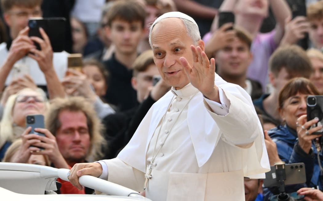 Pope Leo XIV arrives to lead his weekly general audience at St Peter’s square in the Vatican on 15 October, 2025.