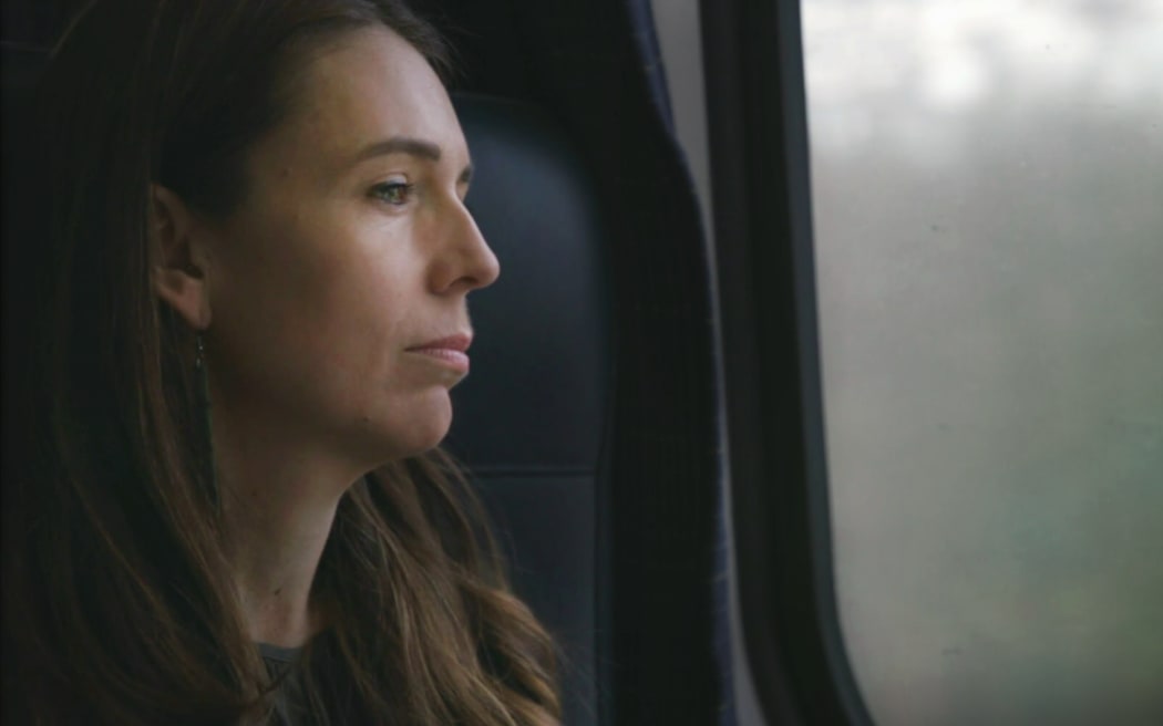Jacinda Ardern stares out a window in a clip from a documentary - Prime Minister - about her tenure.