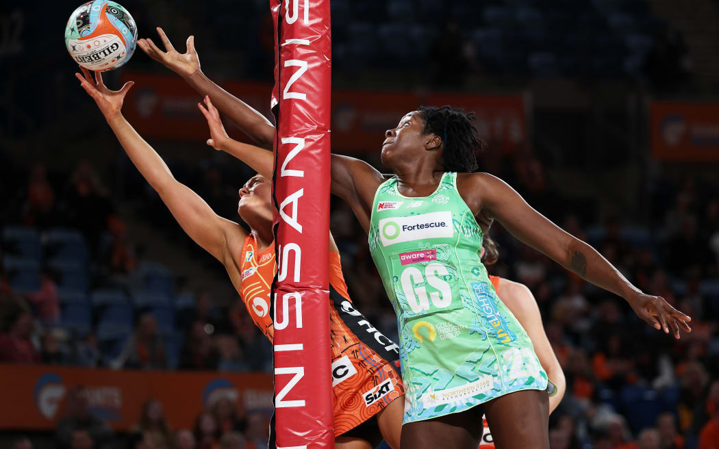 SYDNEY, AUSTRALIA - MAY 24:  Jhaniele Fowler-Nembhard of the Fever competes with Aimee Landrigan of the Giants during the round seven Super Netball match between Giants Netball and West Coast Fever at Ken Rosewall Arena, on May 24, 2025, in Sydney, Australia. (Photo by Matt King/Getty Images)