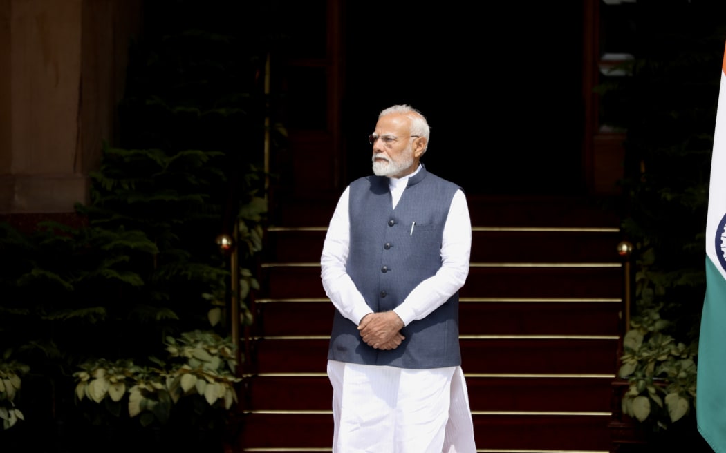 Indian PM Narendra Modhi awaits Christopher Luxon's arrival at Hyderabad House in New Delhi.