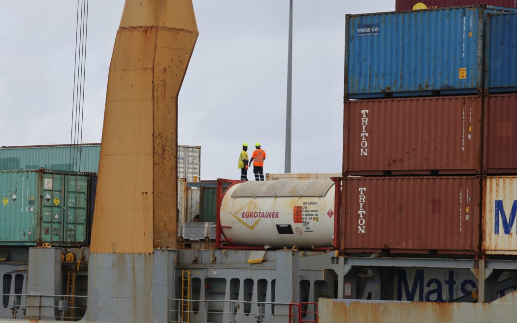 Fuel tanktainers onboard a cargo vessel at Avatiu harbour in 2022.