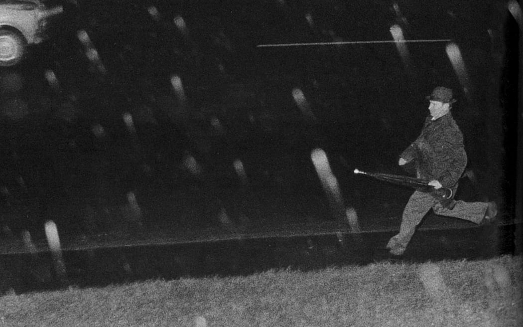 Dimitri Razgovorov running from his meeting with Bill Sutch, Aro St, Wellington, September 1974