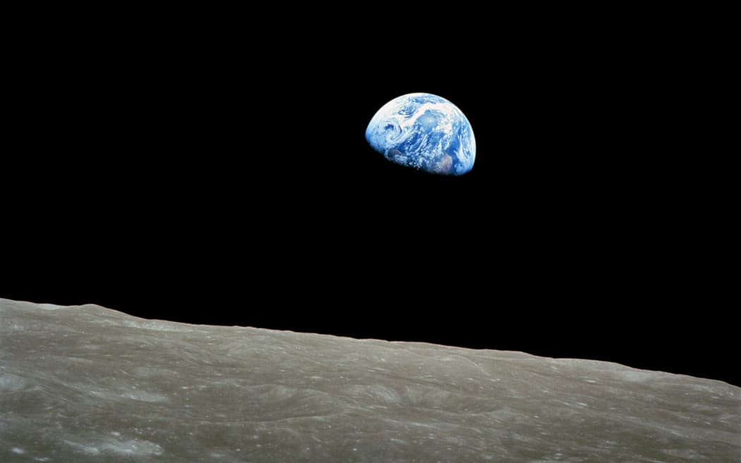 Earthrise, taken from Apollo 8 by William Anders on December 24, 1968