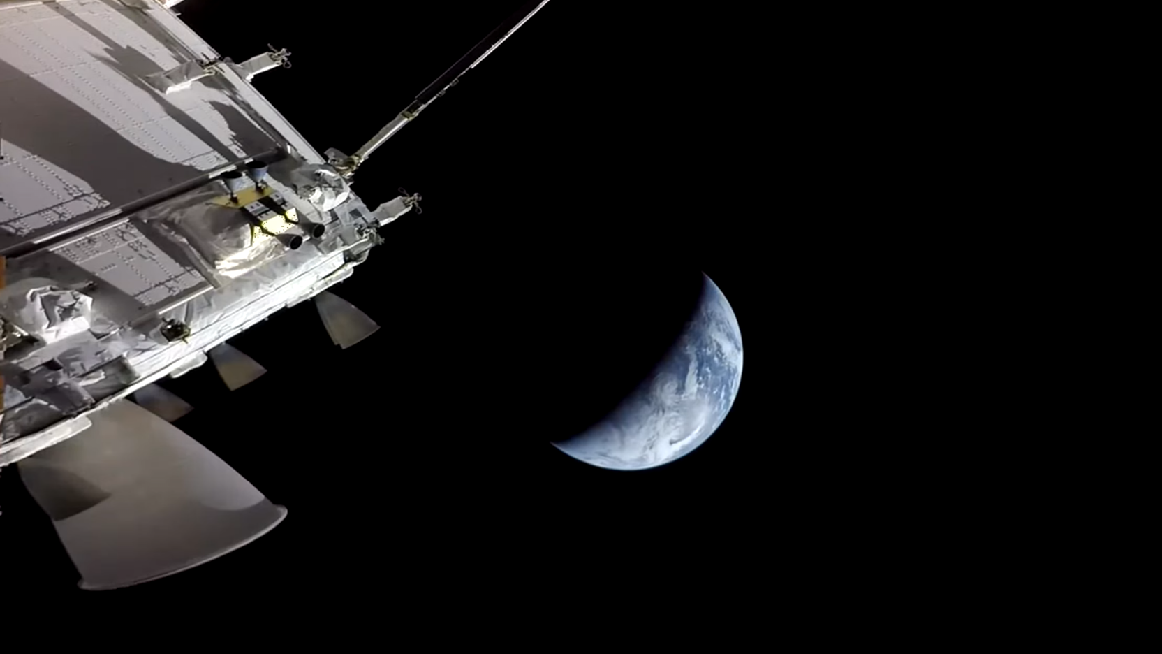 Artemis II looks at Earth from space.