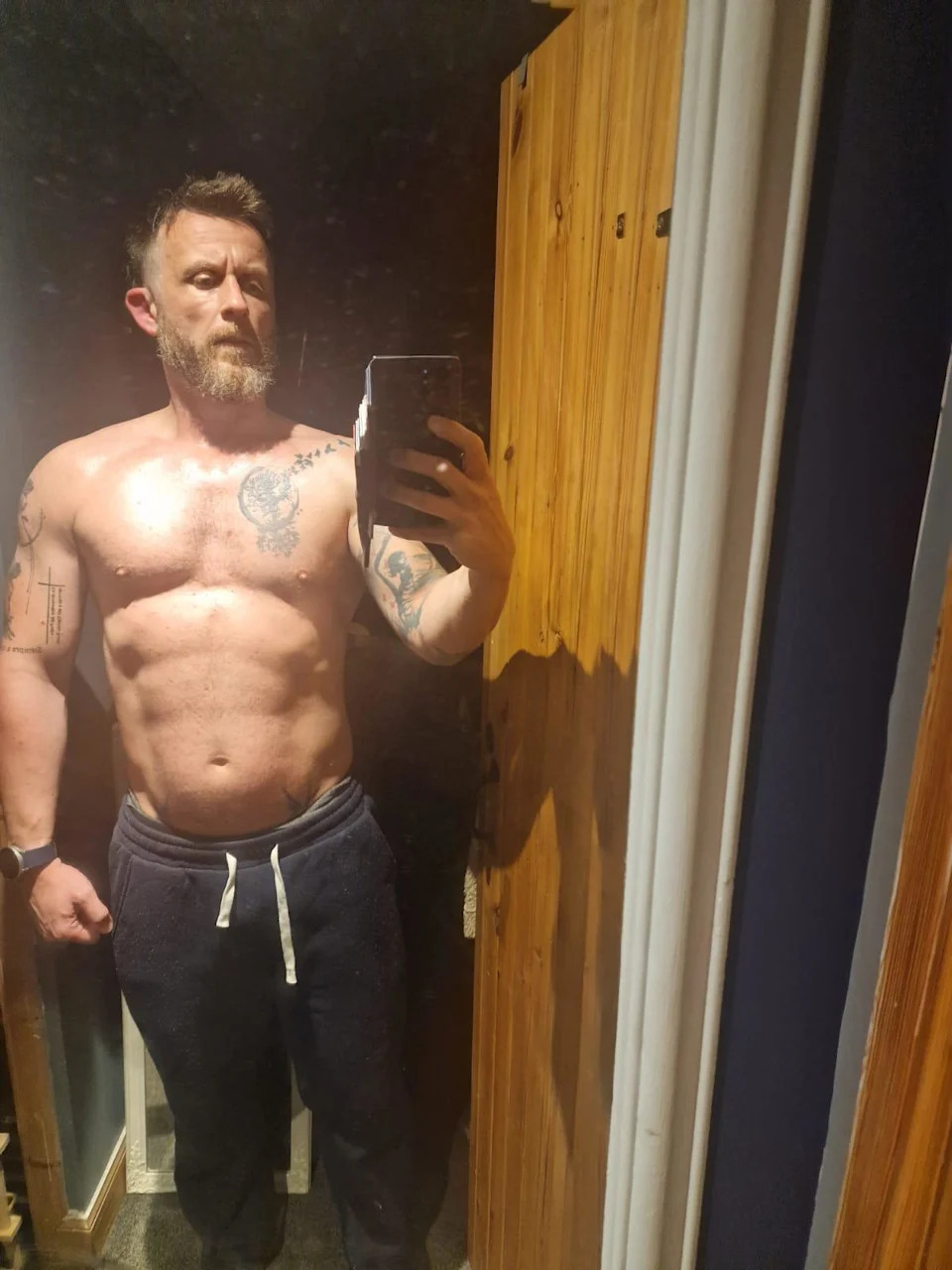 Gordy post-TRT, shirtless mirror selfie