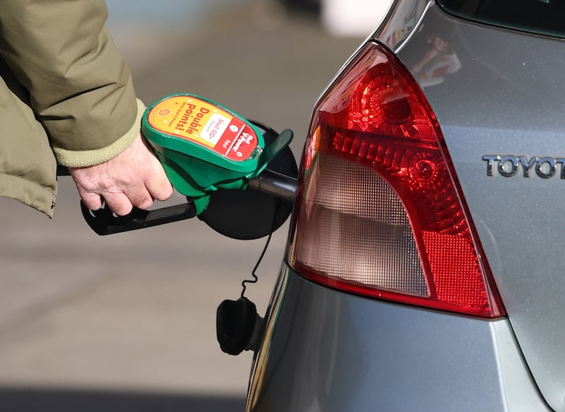 Walk shorter distances, use more public transport, cycle more. Photograph: Neil Hall/EPA