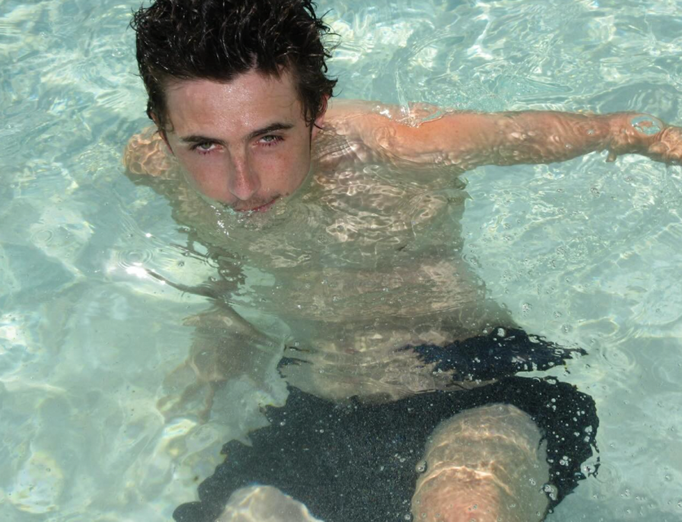 Child swimming in clear water Child swimming in clear water