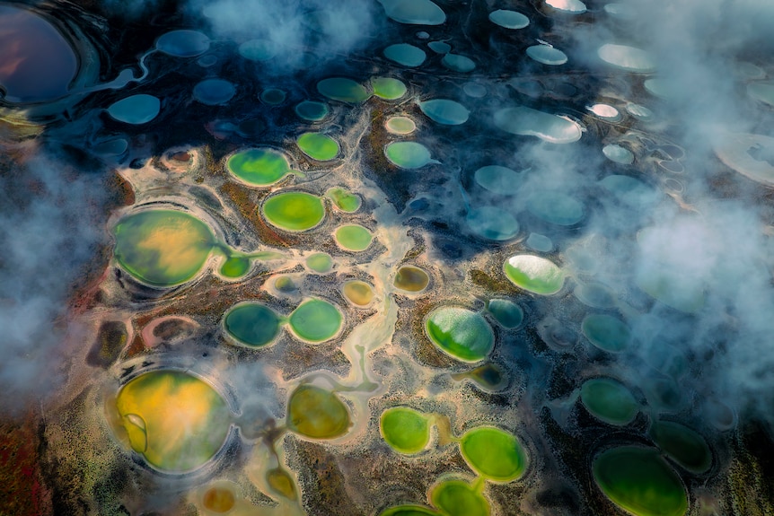 Green salt lakes sit in cropping land