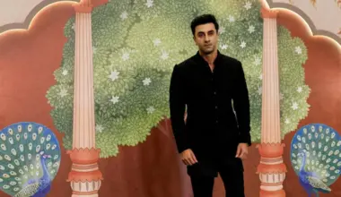 Bollywood actor Ranbir Kapoor poses for pictures on the red carpet as he attends the blessing ceremony of Anant Ambani and Radhika Merchant after their marriage in Mumbai, India, July 13, 2024.