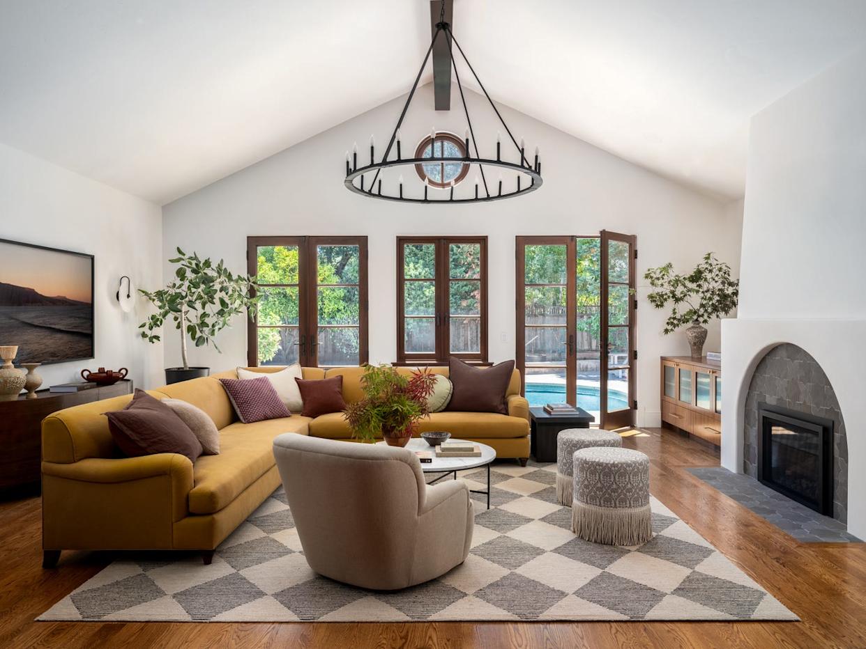 Cozy living room with modern decor and furniture arrangement.