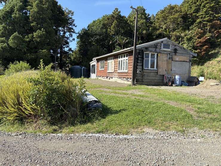 A four-bedroom character home is up for grabs at 306 West Coast Road, in Makarau. Photo / Supplied