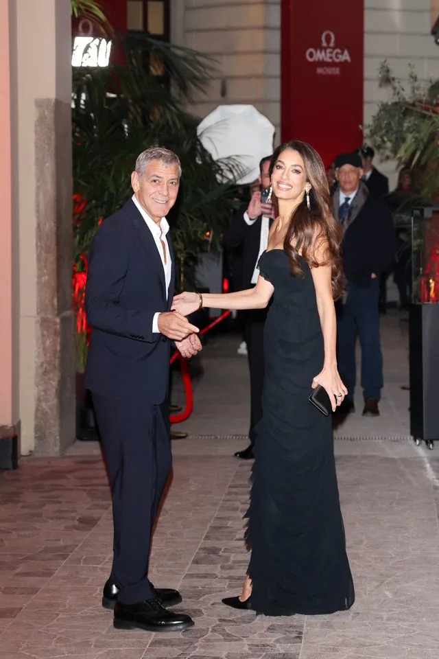 George Clooney and Amal Clooney attend the Omega House opening night during Milano Cortina 2026 Winter Olympics at Omega House on February 7Credit: Getty Images