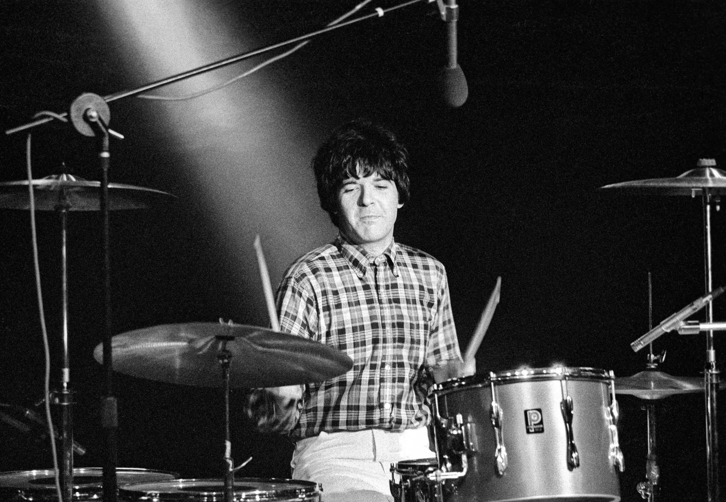 Clem Burke of Blondie playing the drums during the recording of a pop promo for their single 'Picture This'.