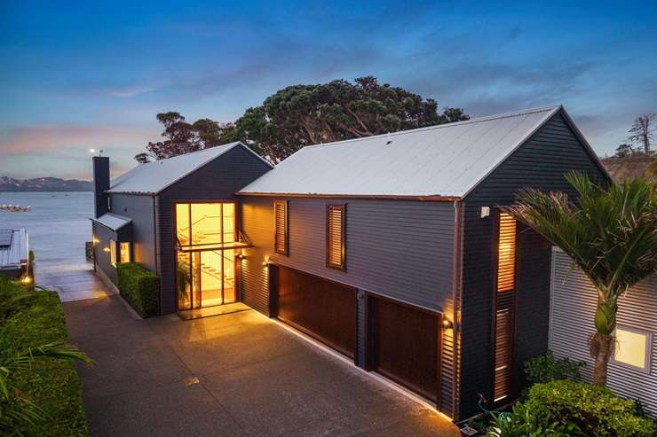 The beachfront home at 8 Musick Point Road is for sale for the first time after 26 years. It was designed by award-winning architect Frans Kamermans. Photo / Supplied