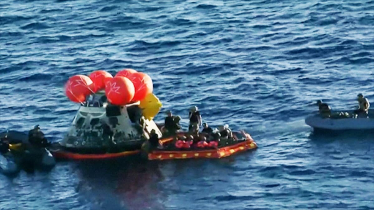 Watch: The moment Artemis II touched down on Earth and the crew was pulled to safety - NZ Herald