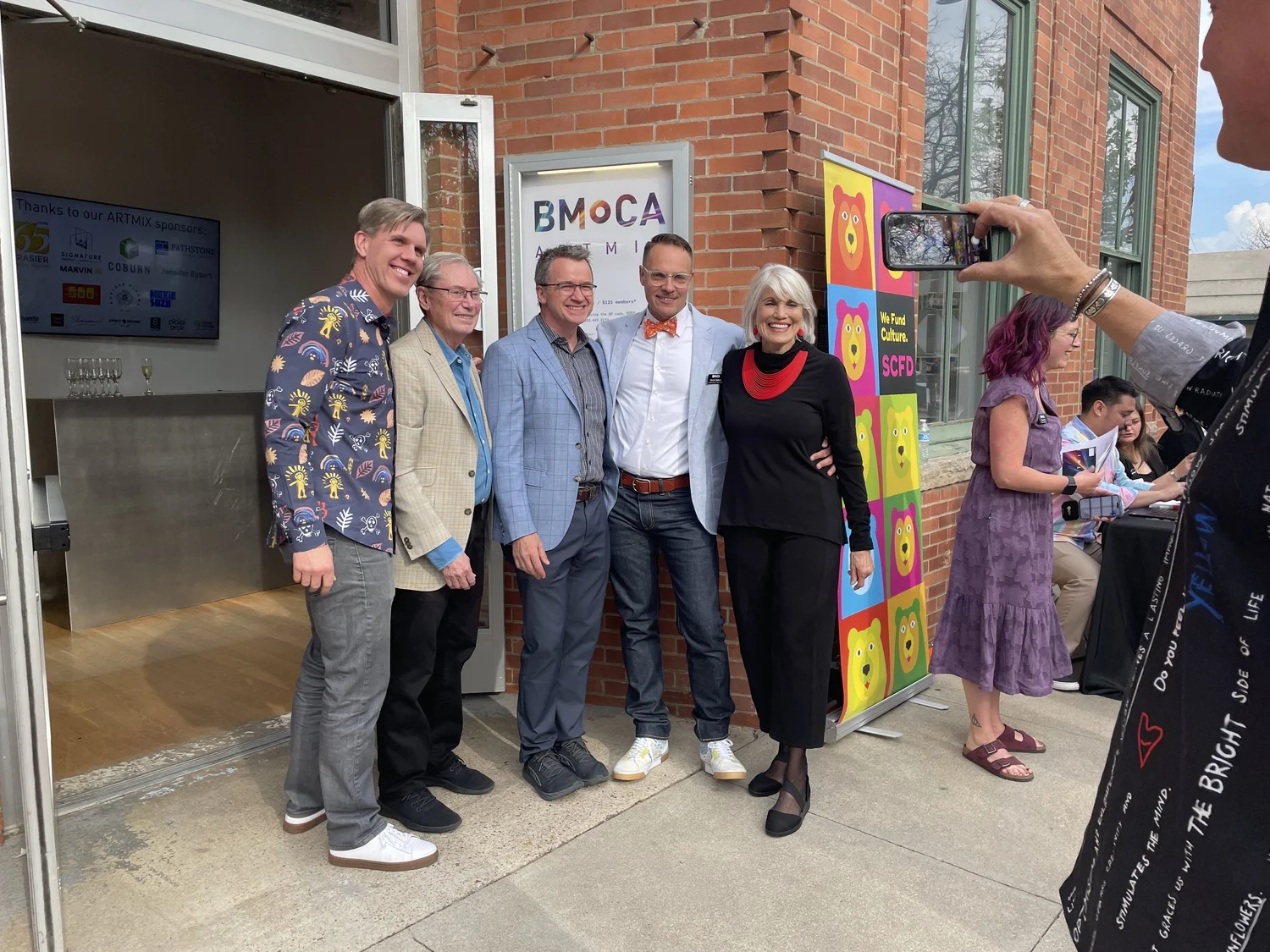 Guests gather outside Boulder Museum of Contemporary Art during a...