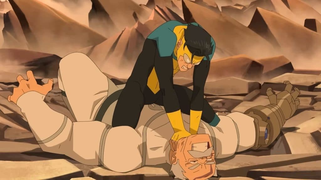 A superhero dressed in a yellow, black, and blue costume chokes a large, muscly older man with a mustache on the floor. The older man is wearing a white uniform and has a large metal gauntlet on his right arm.