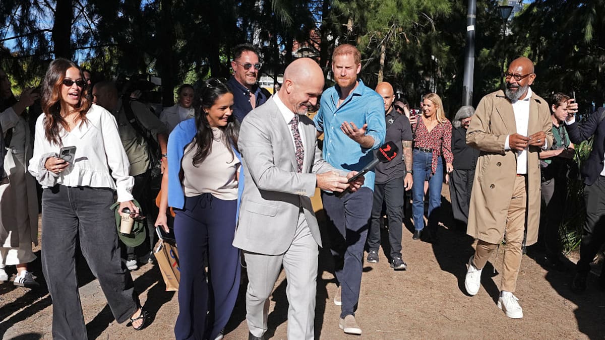 Prince Harry and Meghan visit Melbourne as awkward selfie bid makes headlines