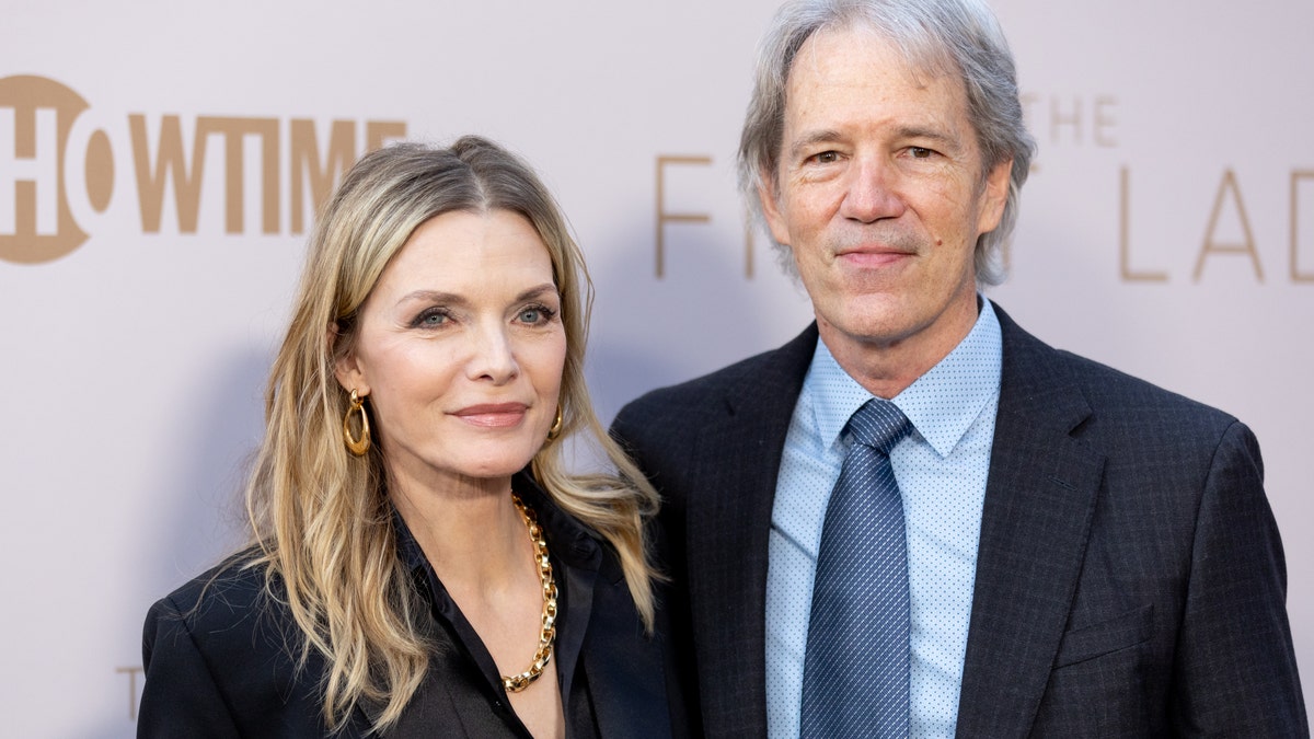 Michelle Pfeiffer and David E. Kelley arriving at an event in Los Angeles